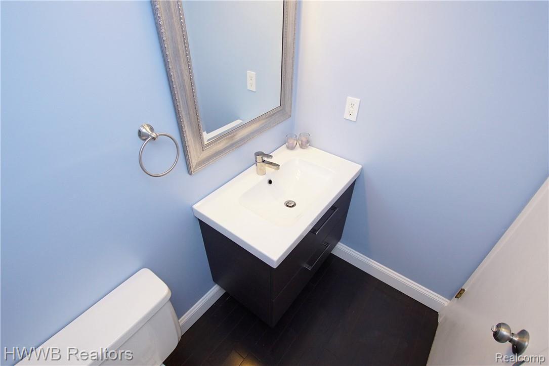 1408 Crescent Lane Rochester, MI 48306 - Photo 12 of 29 1st floor powder room has under vanity lighting