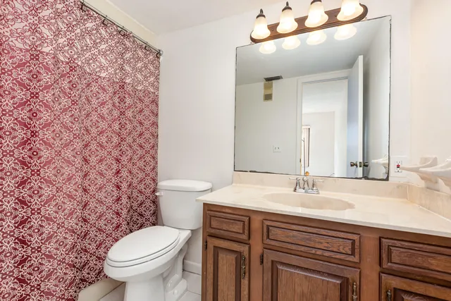 a bathroom with a sink and a toilet