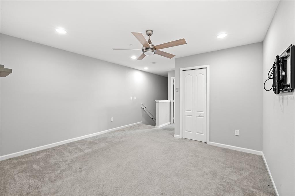 260 Smugglers Way Apopka, FL 32712 - Photo 17 of 34 wooden floor in an empty room