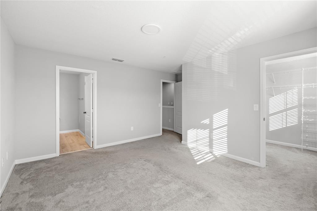 260 Smugglers Way Apopka, FL 32712 - Photo 19 of 34 a view of an empty room with a fireplace