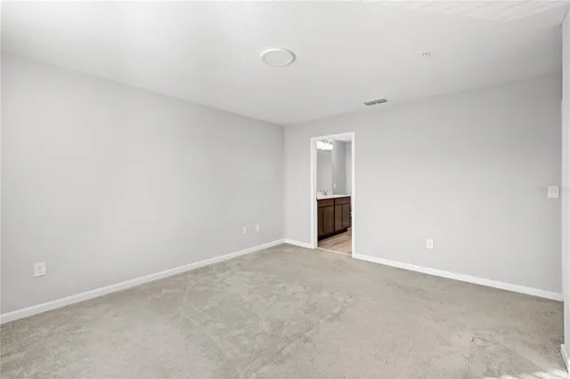 a bathroom with a sink a mirror and a shower
