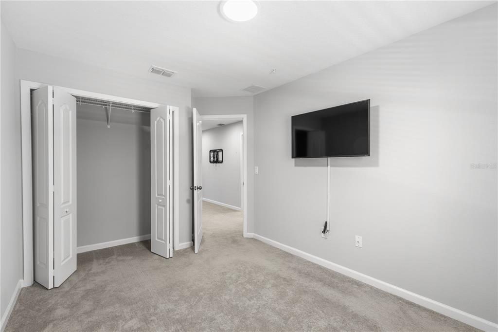 260 Smugglers Way Apopka, FL 32712 - Photo 26 of 34 a view of a livingroom with a flat screen tv