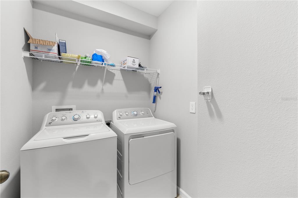 260 Smugglers Way Apopka, FL 32712 - Photo 31 of 34 a utility room with dryer and washer