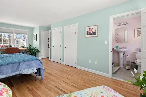 a bathroom with a sink a mirror and a shower
