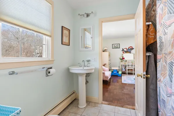 a view of a bench with snow on the side of it