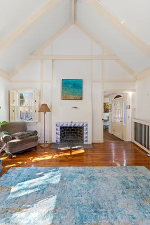 a view of a living room and window