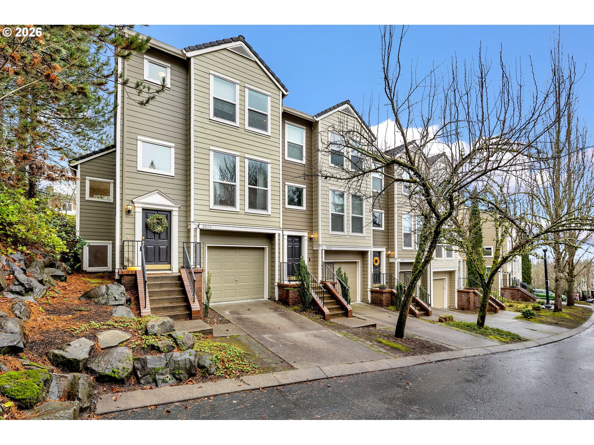 a view of a yard in front of a house