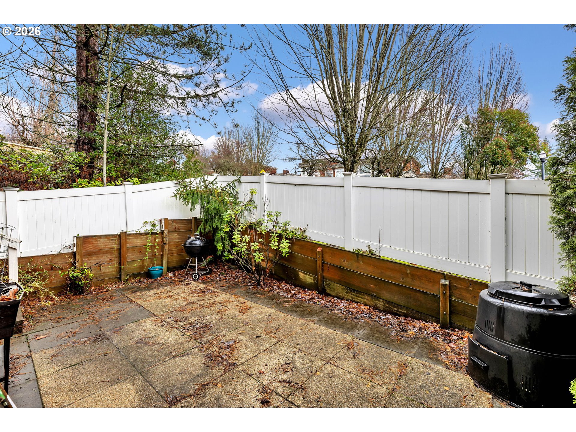 2974 Northwest Kennedy Court, Unit 1 Portland, OR 97229 - Photo 34 of 37 a view of a terrace with chairs
