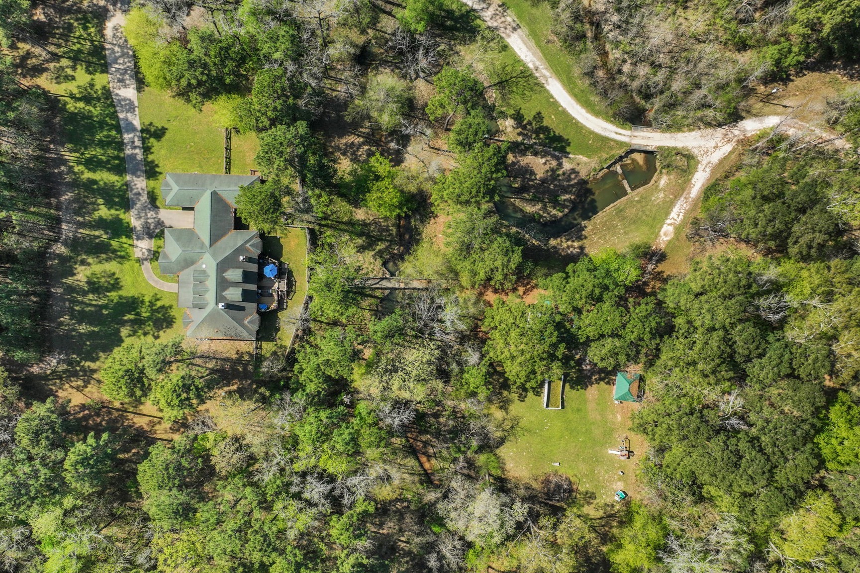 250 Critter Creek Road Coldspring, TX 77331 - Photo 1 of 48 Welcome to 250 Critter Creek in Coldspring, Texas