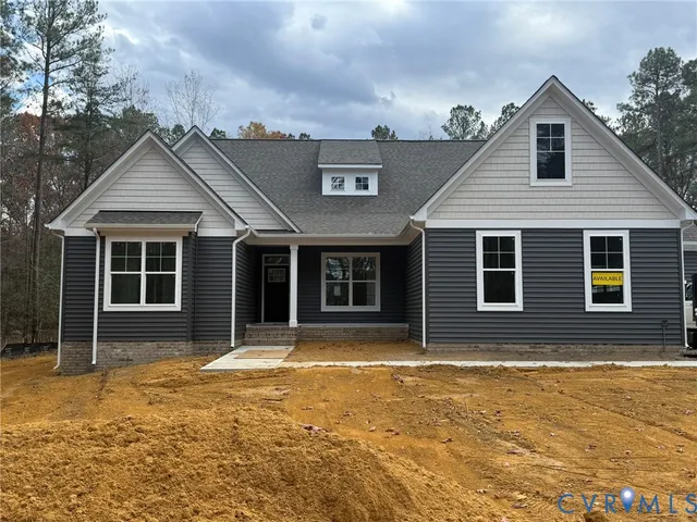a house with trees in the background