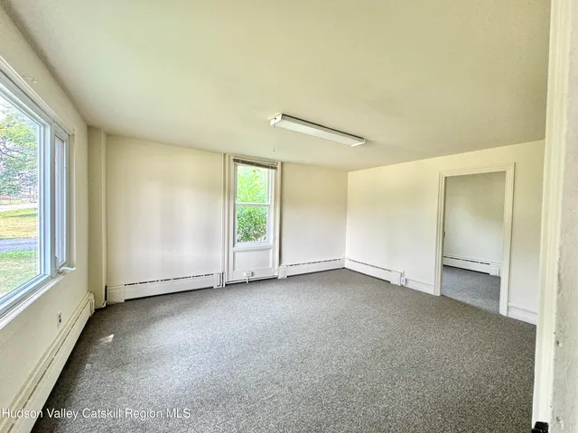 an empty room with window