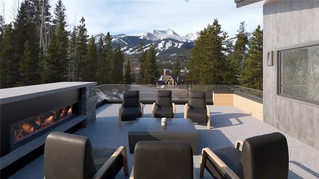 a view of a dining tables and chairs in the balcony