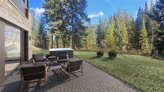 a view of a patio with a yard