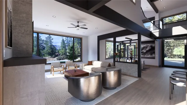 a living room with large window and furniture