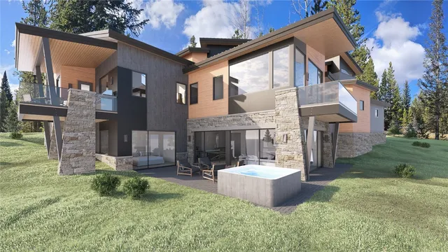 a front view of a house with a garden and patio