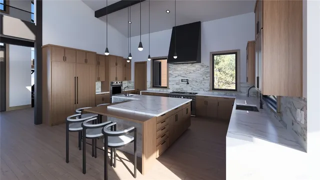 a kitchen with stainless steel appliances granite countertop a sink a stove and a refrigerator