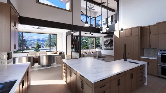 a kitchen with stainless steel appliances granite countertop a sink a stove and a wooden floors