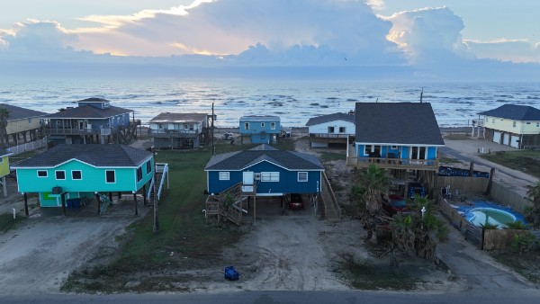 Aerial view of residential area with a large body of water