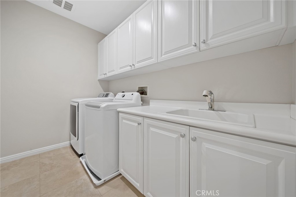 18 Foliate Way Ladera Ranch, CA 92694 - Photo 42 of 71 Upstairs Laundry Rroom
