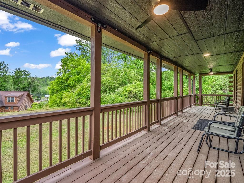 112 Bills Creek Road Lake Lure, NC 28746 - Photo 4 of 42 a view of balcony with wooden floor
