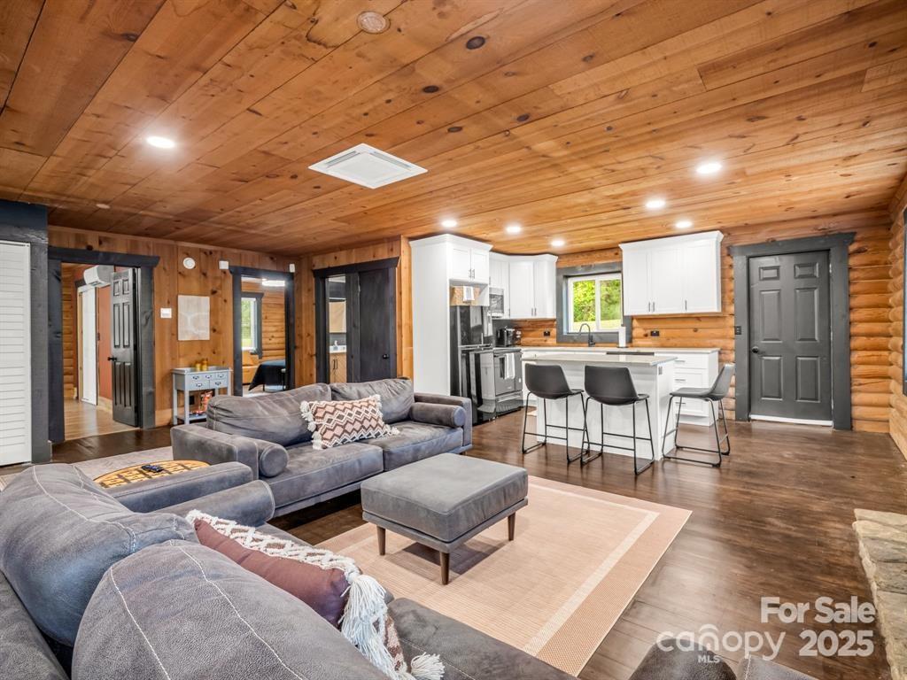 112 Bills Creek Road Lake Lure, NC 28746 - Photo 9 of 42 a living room with furniture and a table