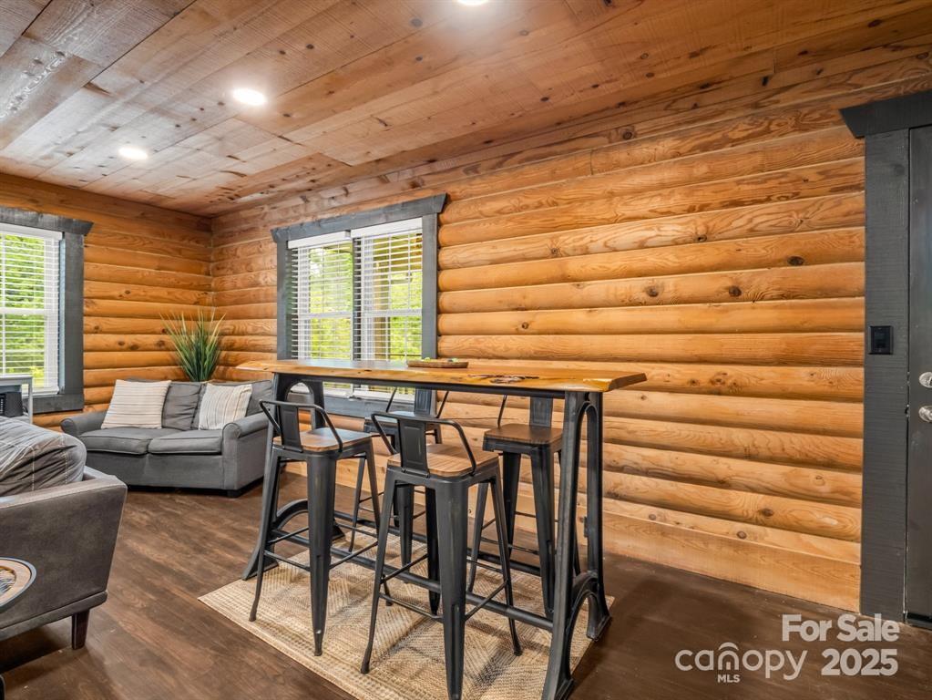 112 Bills Creek Road Lake Lure, NC 28746 - Photo 10 of 42 a dining room with furniture and window