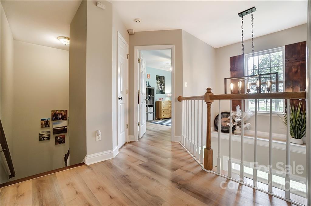 917 Potter Road Monroe, NC 28110 - Photo 11 of 25 a view of a hallway with a furniture