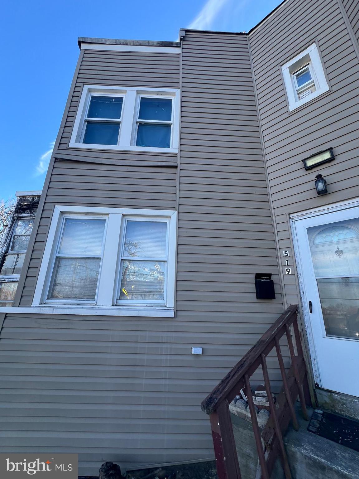 519 Cherry Hill Road Baltimore, MD 21225 - Photo 3 of 20 a side view of a house