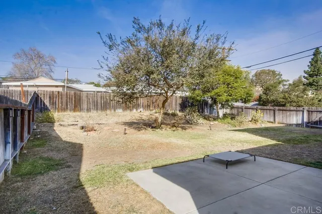 a view of a yard with an outdoor space