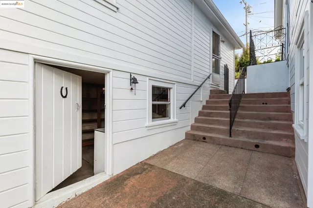 a view of entryway with workspace and window
