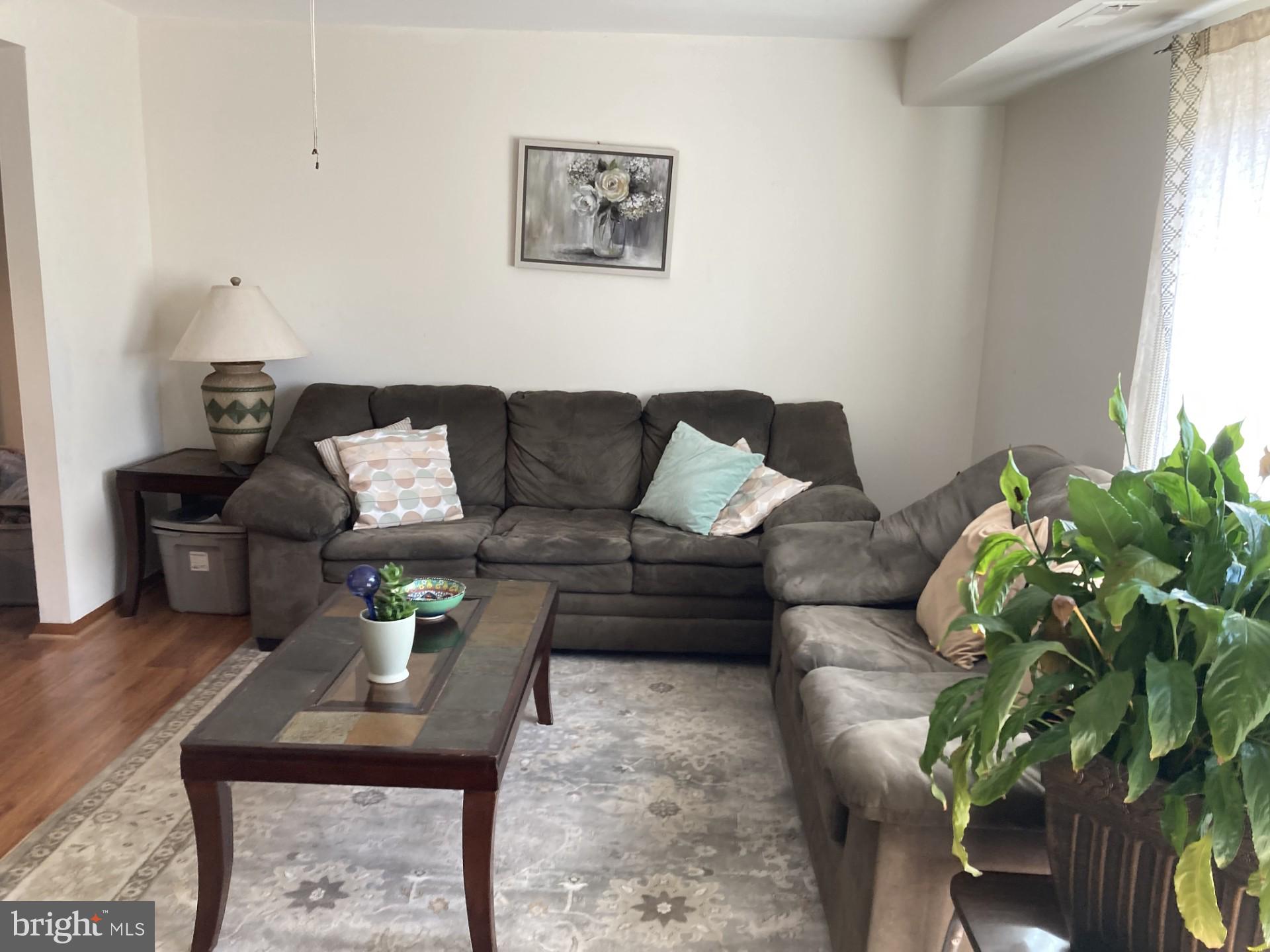 2310 Sun Valley Circle, Unit 1D Silver Spring, MD 20906 - Photo 8 of 20 a living room with furniture