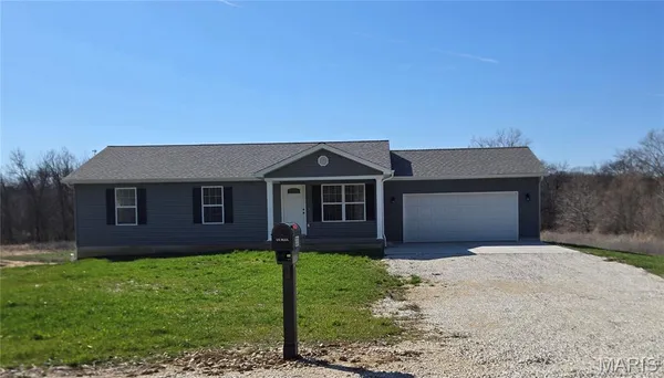 $312,500 | 221 Sycamore Creek Drive, Winfield, MO 63389