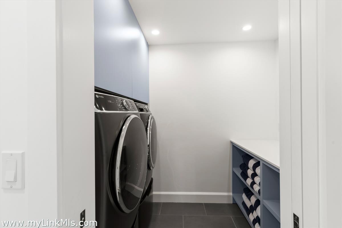 3 Tautemo Way Nantucket, MA 02554 - Photo 42 of 57 a view of walk in closet with clothes and shoes