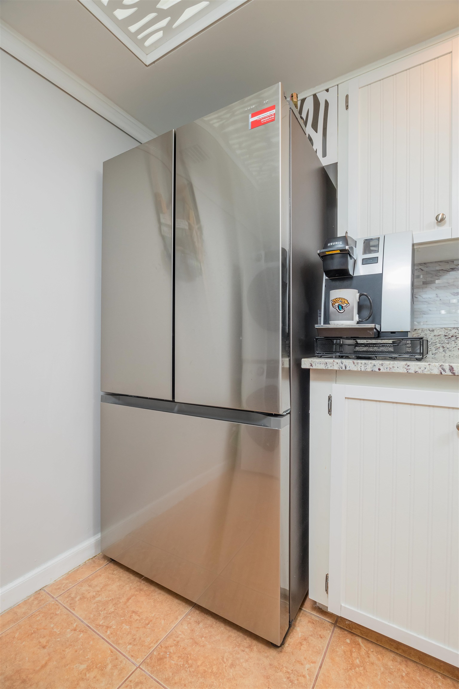1 Dondanville Road, Unit 116C St. Augustine, FL 32080 - Photo 13 of 59 a kitchen with metallic refrigerator freezer and a dishwasher