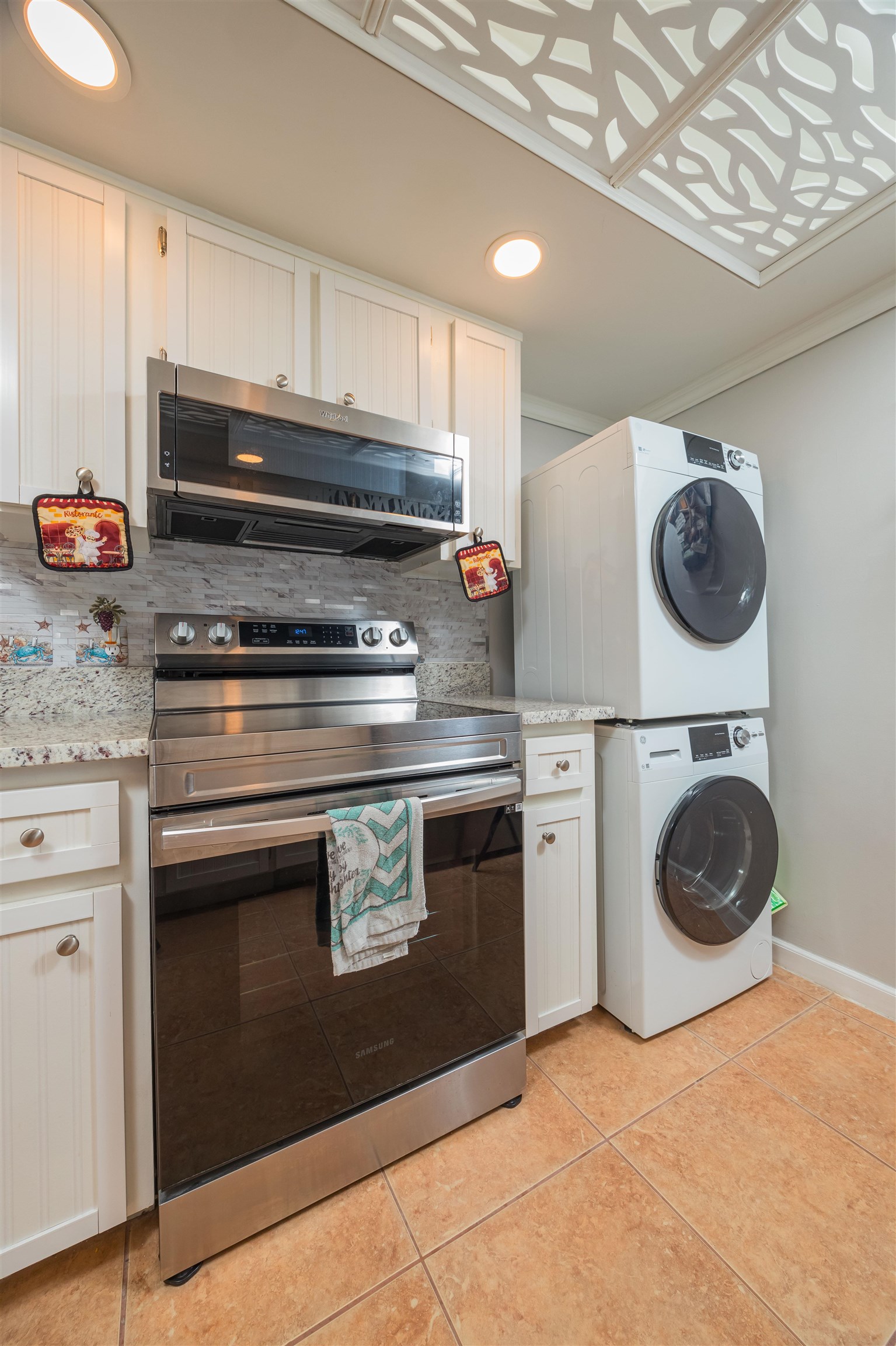 1 Dondanville Road, Unit 116C St. Augustine, FL 32080 - Photo 14 of 59 a kitchen with a stove and a refrigerator