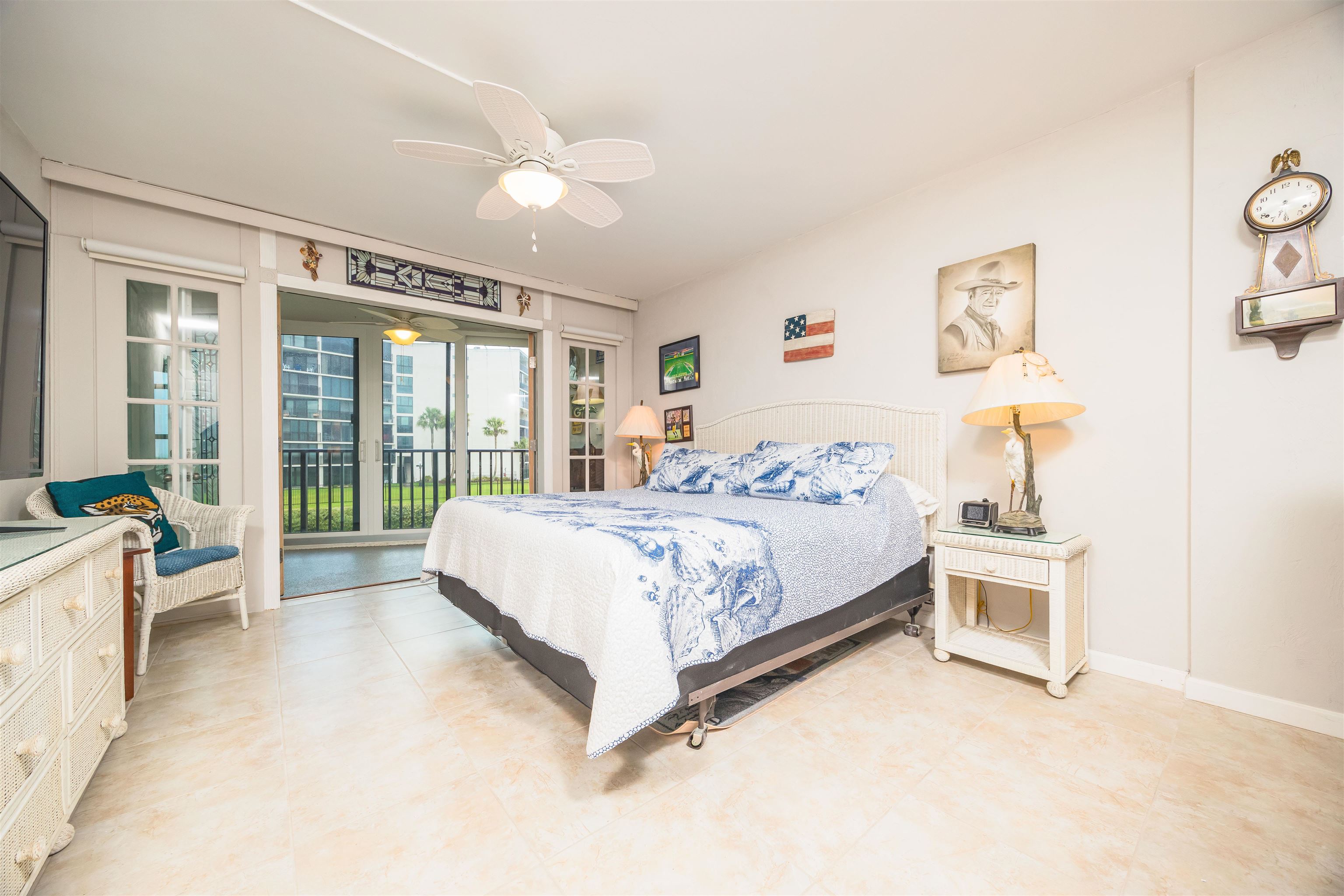 1 Dondanville Road, Unit 116C St. Augustine, FL 32080 - Photo 26 of 59 a bed sitting in a spacious bedroom next to a window
