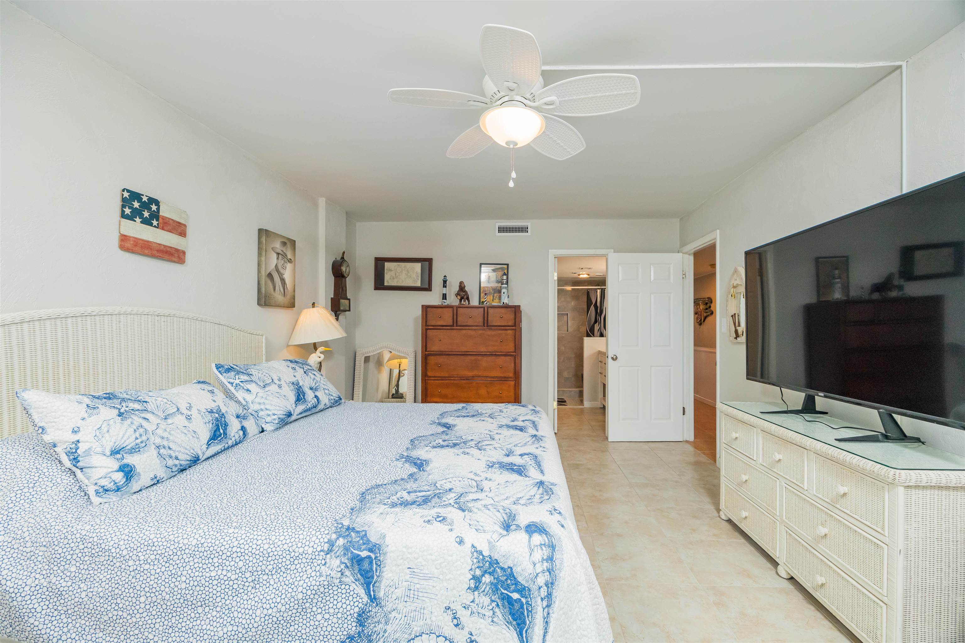 1 Dondanville Road, Unit 116C St. Augustine, FL 32080 - Photo 29 of 59 a bedroom with a bed and a flat screen tv