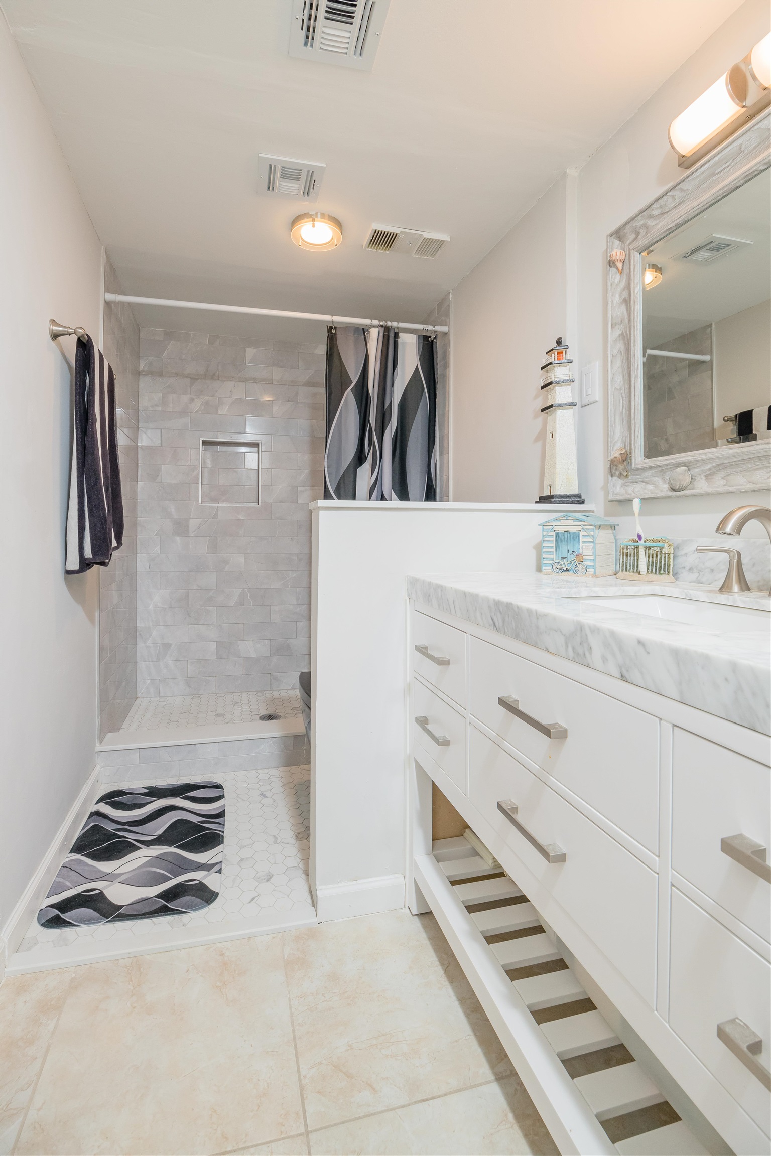 1 Dondanville Road, Unit 116C St. Augustine, FL 32080 - Photo 31 of 59 a kitchen with white cabinets and appliances