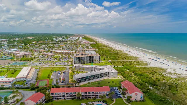 a bathroom with a shower and a bath tub