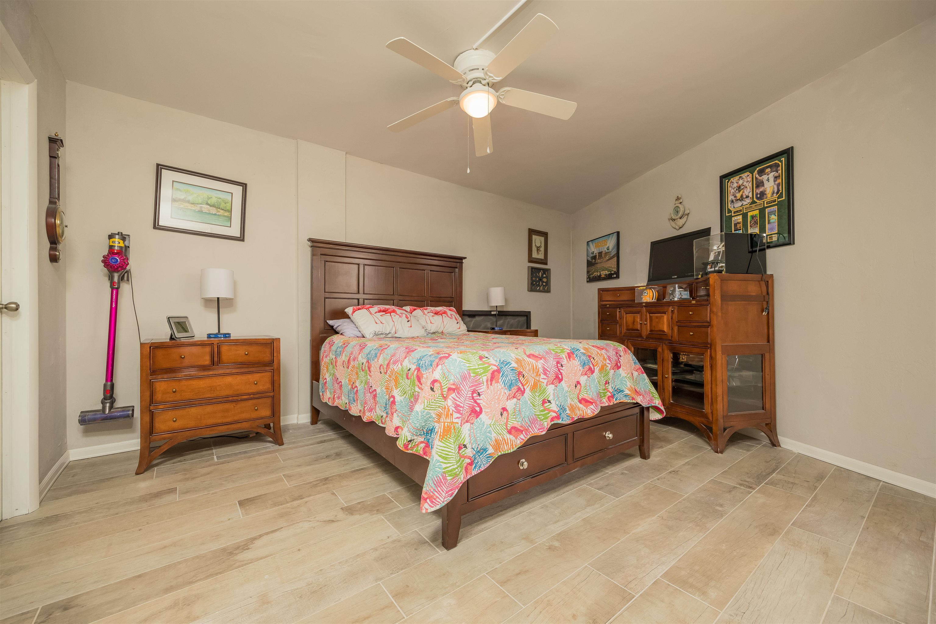 1 Dondanville Road, Unit 116C St. Augustine, FL 32080 - Photo 36 of 59 a bedroom with a bed and a chandelier