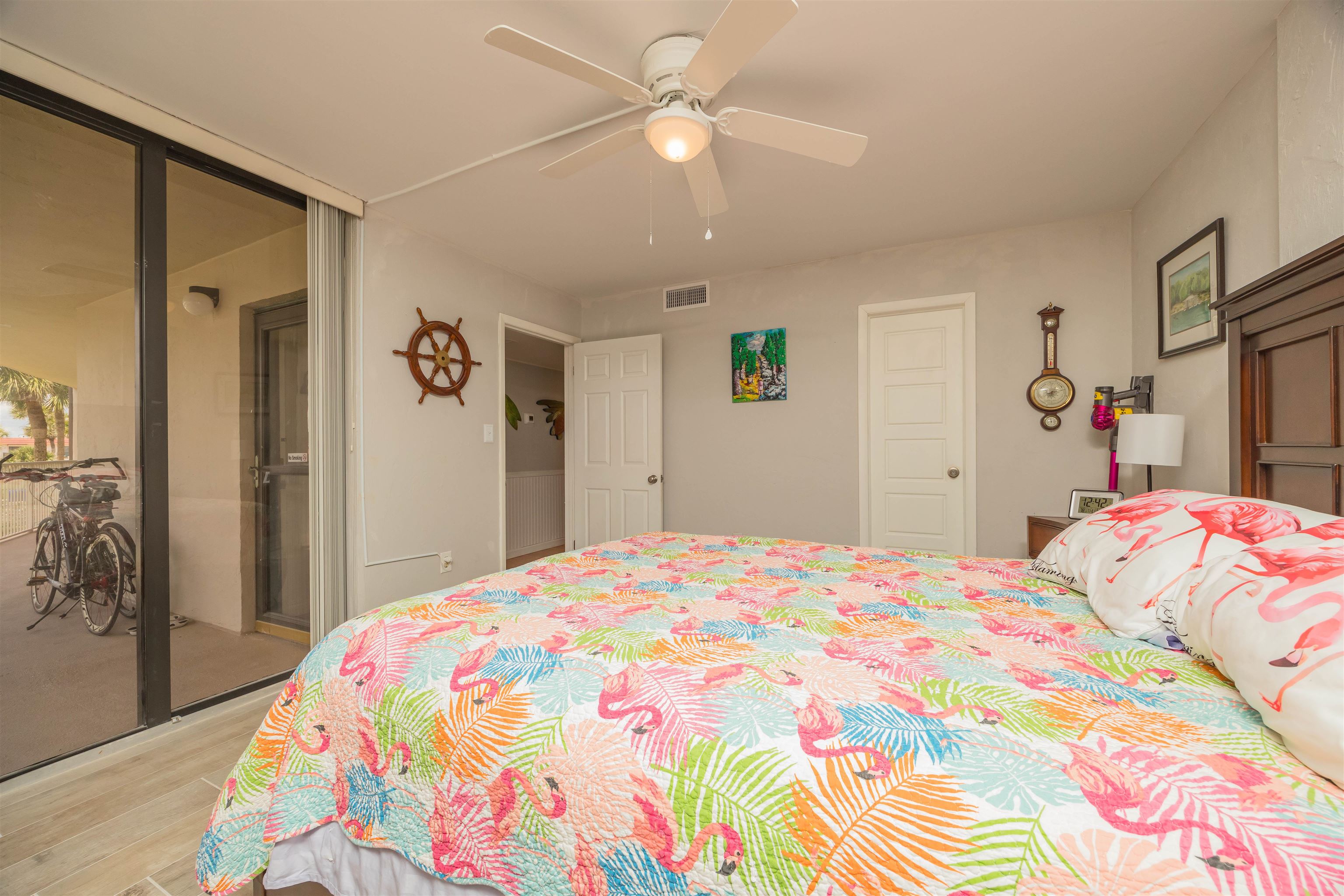 1 Dondanville Road, Unit 116C St. Augustine, FL 32080 - Photo 39 of 59 a bedroom with a bed and a dresser