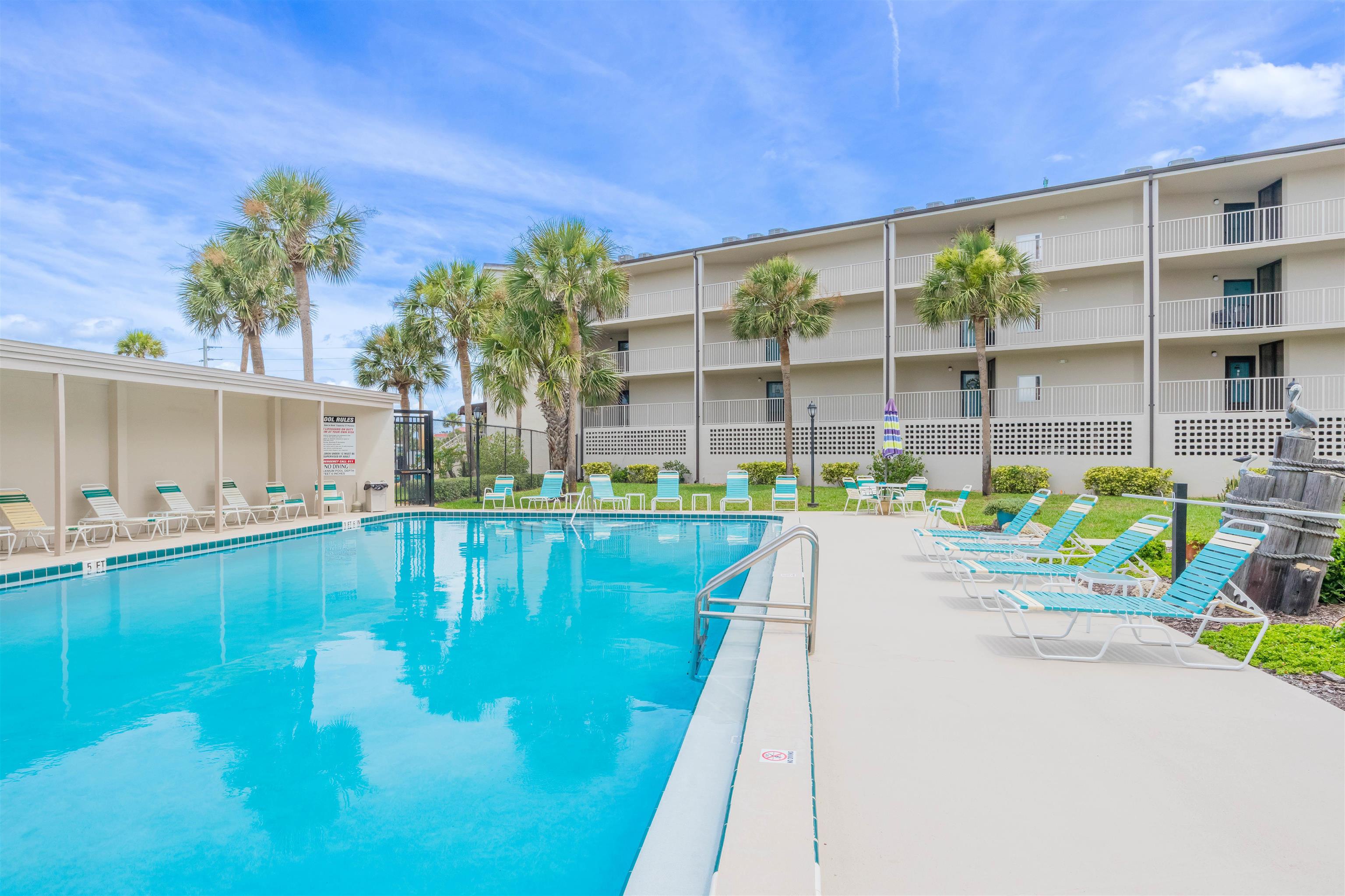 1 Dondanville Road, Unit 116C St. Augustine, FL 32080 - Photo 42 of 59 a view of a swimming pool with a porch