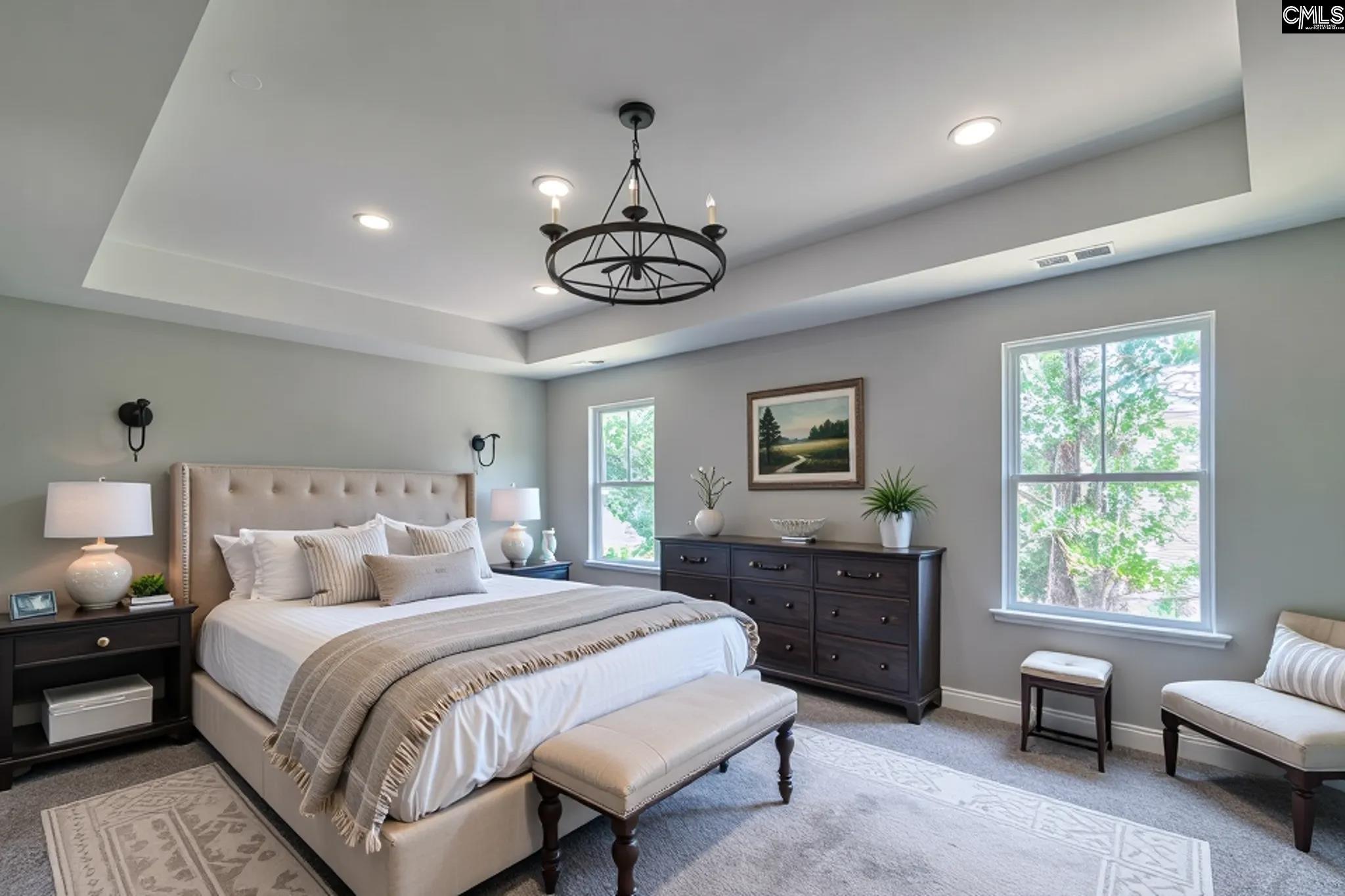 265 Eastover Road Eastover, SC 29044 - Photo 5 of 15 a bedroom with a bed and a chandelier
