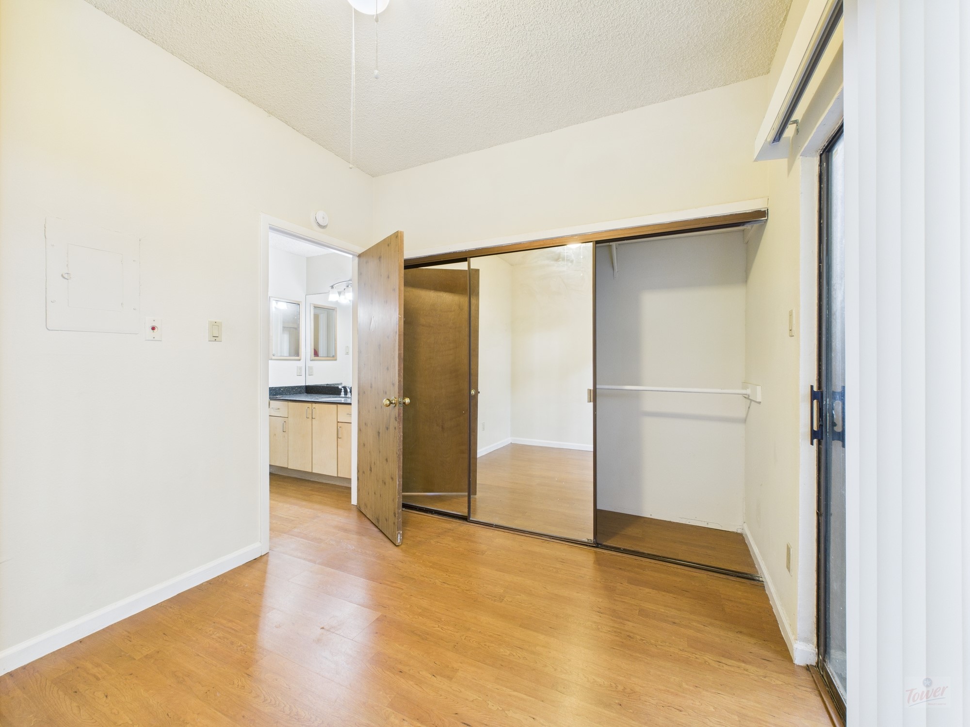 2815 Rio Grande Street, Unit 109 Austin, TX 78705 - Photo 13 of 25 a view of empty room with wooden floor