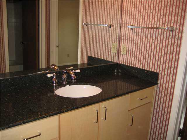 2815 Rio Grande Street, Unit 109 Austin, TX 78705 - Photo 18 of 20 a bathroom with a sink and a mirror