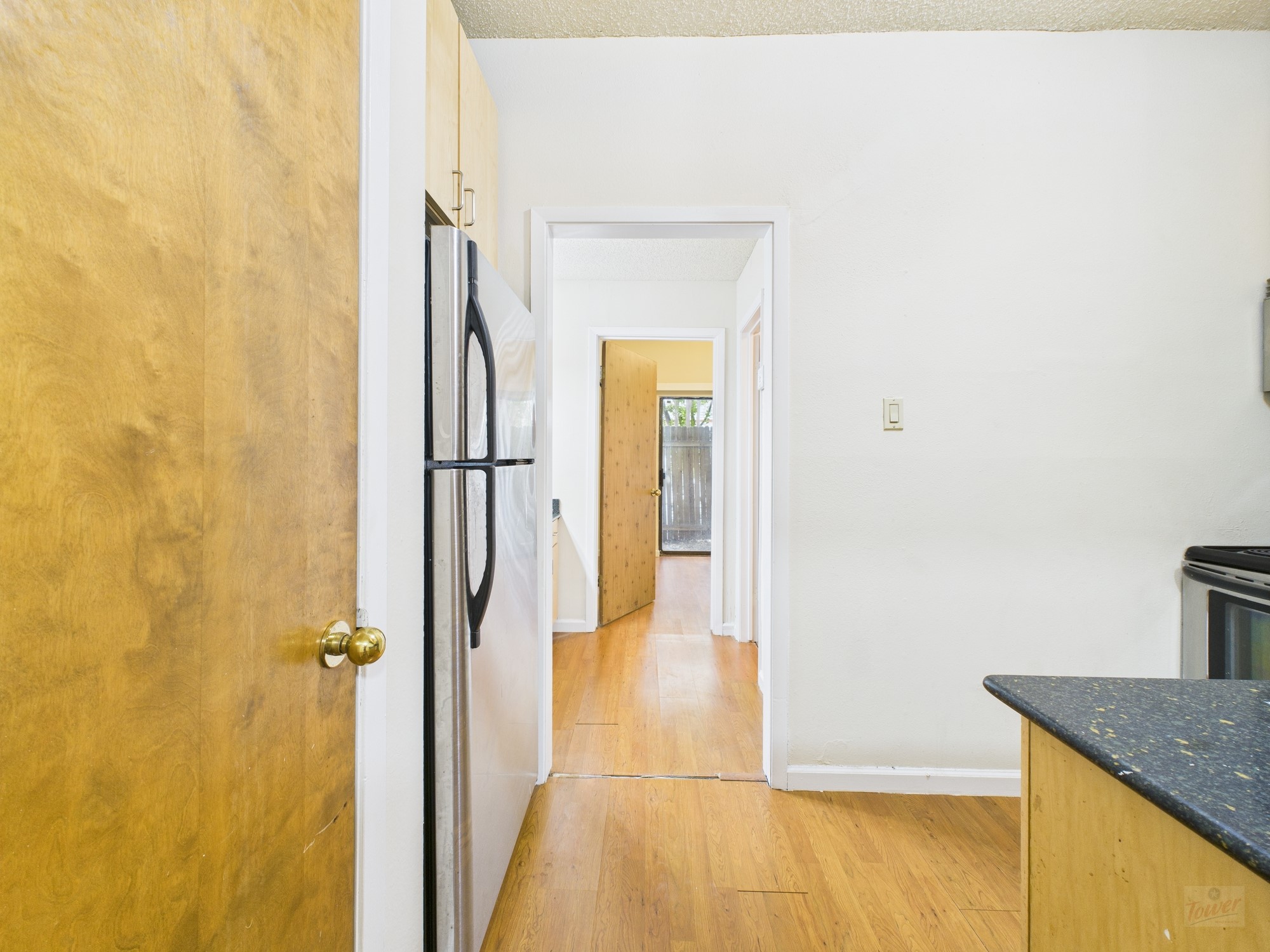 2815 Rio Grande Street, Unit 109 Austin, TX 78705 - Photo 4 of 25 a view of a bathroom from a hallway