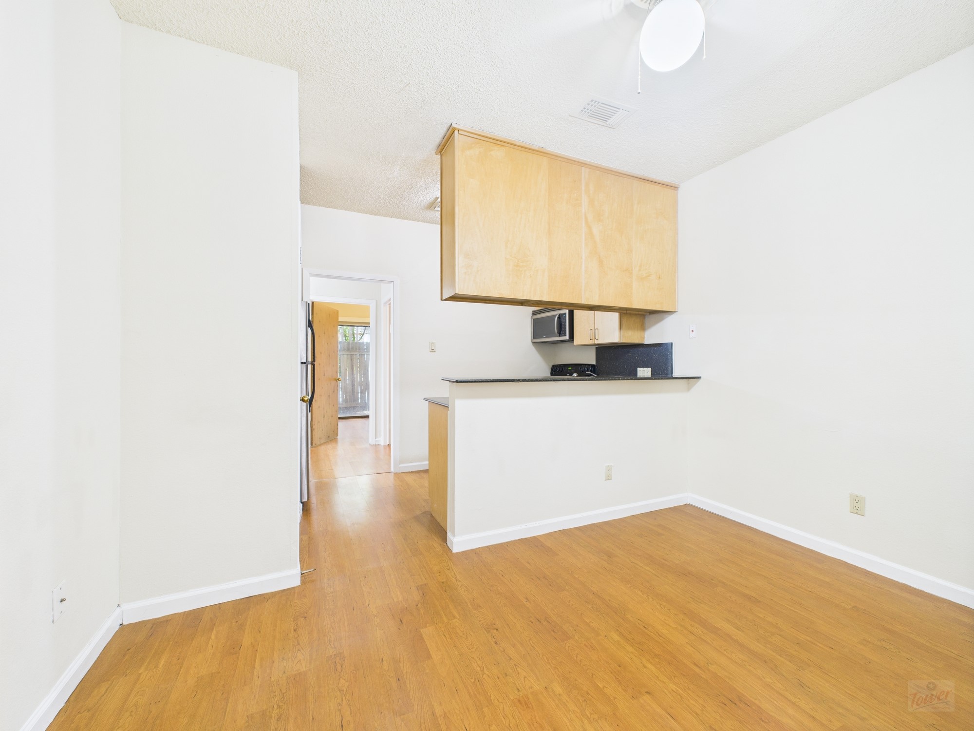 2815 Rio Grande Street, Unit 109 Austin, TX 78705 - Photo 5 of 25 a view of a kitchen with a sink