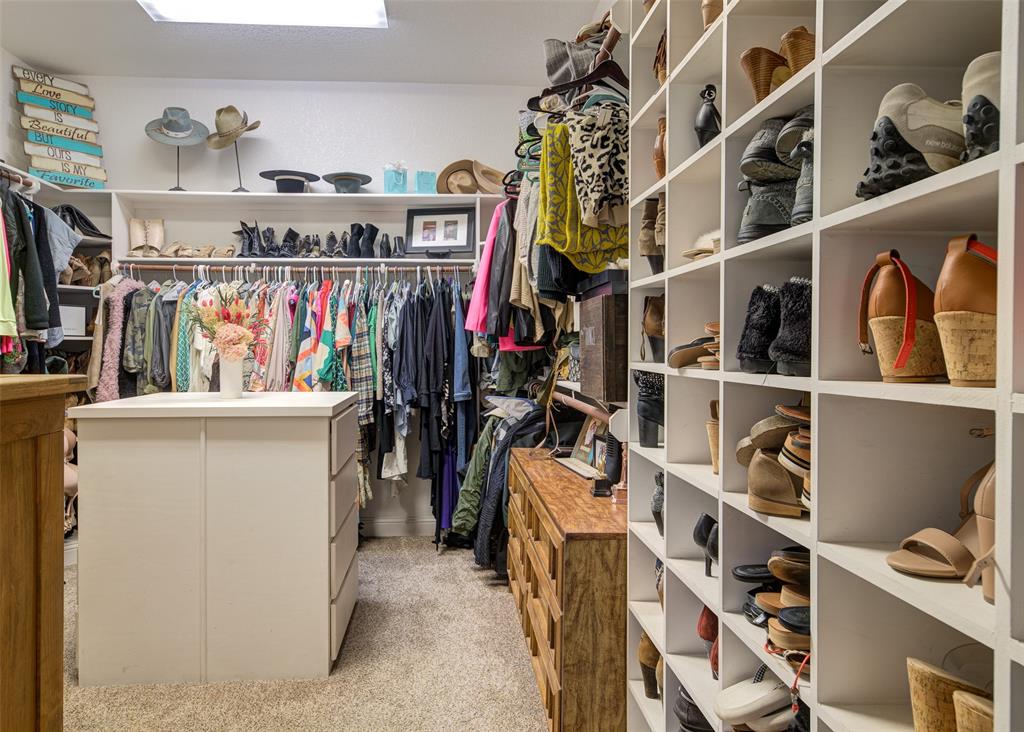 9199 Fm 1810 Chico, TX 76431 - Photo 17 of 40 a view of walk in closet with clothes and shoes