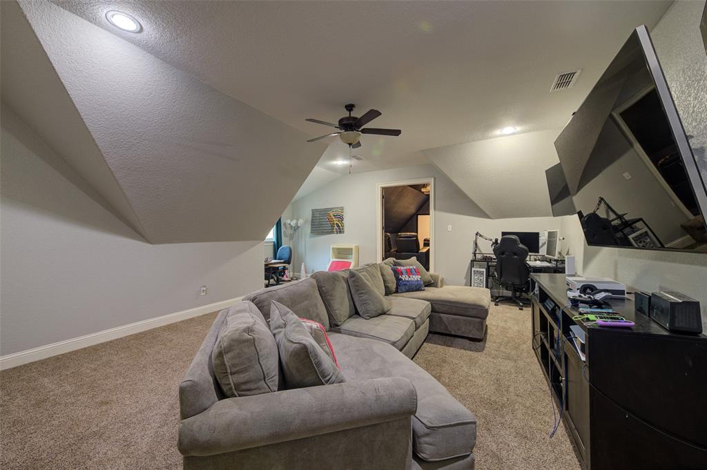 9199 Fm 1810 Chico, TX 76431 - Photo 26 of 40 a living room with furniture and a flat screen tv