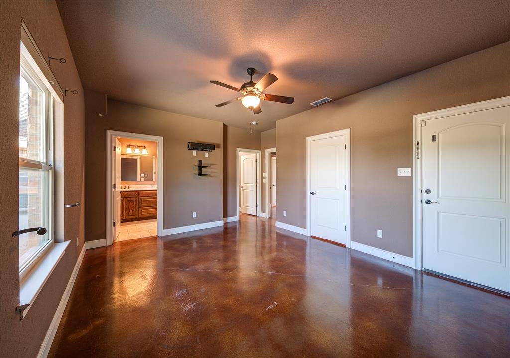 9199 Fm 1810 Chico, TX 76431 - Photo 31 of 40 a view of an empty room with window and wooden floor